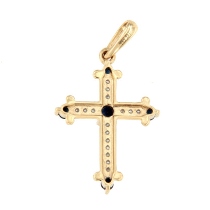 CLARIVA cross in 14k gold with diamonds and sapphire/emerald