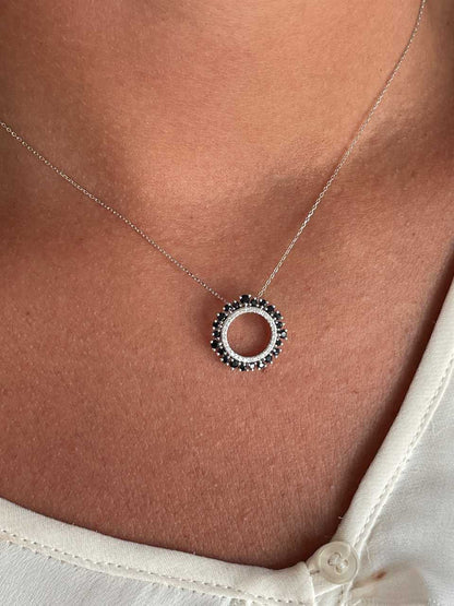 Colgante SOLARA en oro 14 ktes con brillantes y rubíes/esmeraldas