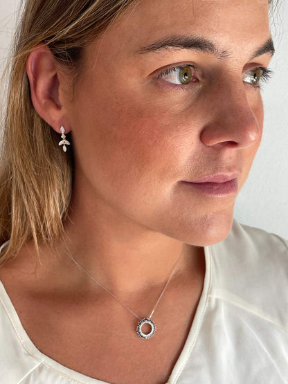 Colgante SOLARA en oro 14 ktes con brillantes y rubíes/esmeraldas