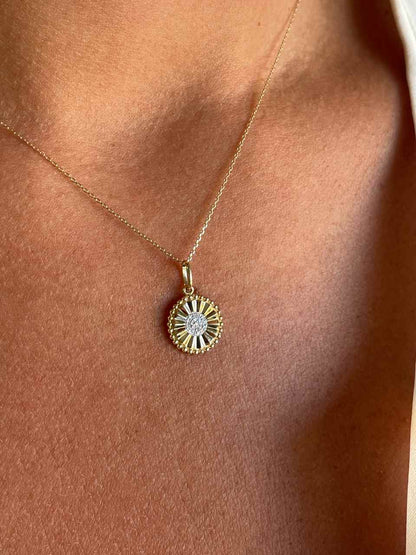 Colgante ORUMA en oro amarillo 14 ktes con brillantes