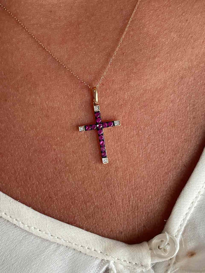 ESVARA cross in 14k yellow gold with diamonds and emeralds