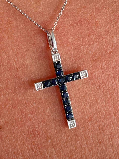 ESVARA cross in 14k yellow gold with diamonds and emeralds