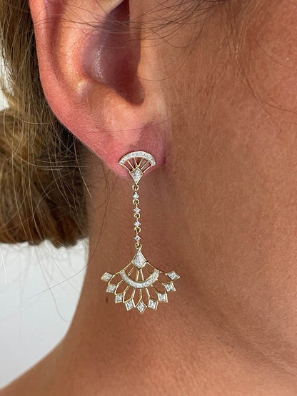 Pendientes EQUINOCIO largos en oro amarillo y blanco con brillantes 14 ktes