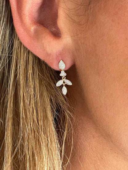 Pendientes BAKU hojas con brillantes en oro amarillo y blanco en 14 ktes.