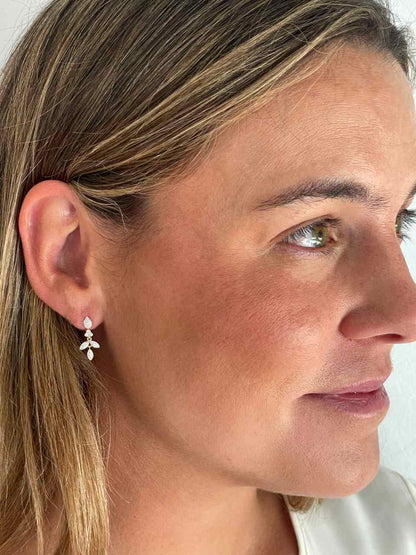 Pendientes BAKU hojas con brillantes en oro amarillo y blanco en 14 ktes.