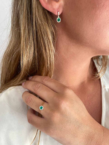 Anillo ACORA con esmeralda y brillantes en oro amarillo y blanco de 14 ktes.