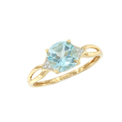 Anillo JARTUM con brillantes en oro amarillo de 14 ktes y Topacio azul
