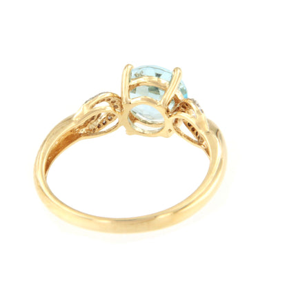 Anillo ASMAR topacio azul con brillantes en oro amarillo de 14 ktes