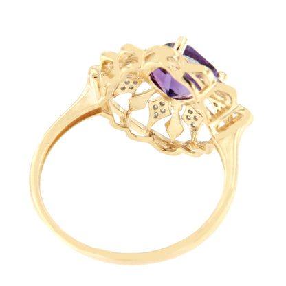 Anillo MAKO con amatista y brillantes en oro amarillo y blanco de 14 ktes