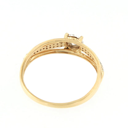 Anillo MENTO con brillantes en oro amarillo y blanco de 14 ktes.
