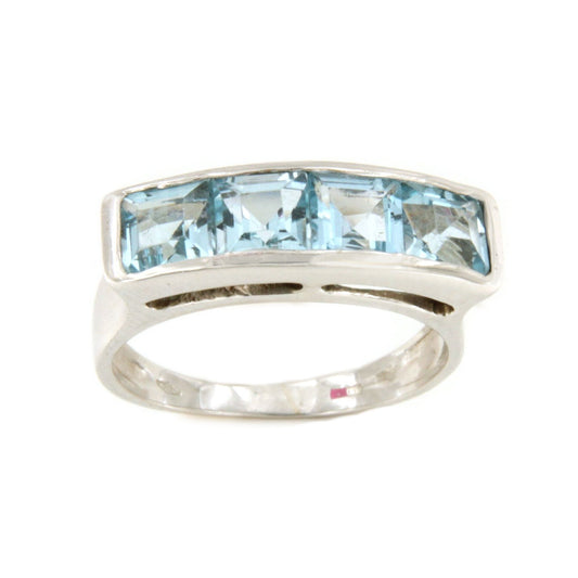 Anillo PILOÑA con princesas de cuarzo azul en oro blanco de 18 ktes.