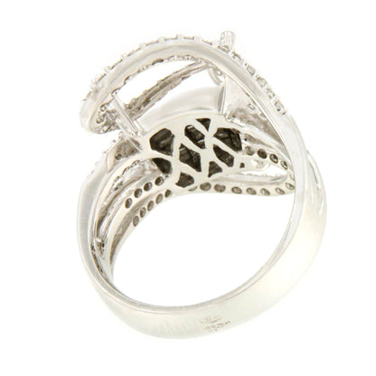Anillo BADALONA en oro blanco de 18 ktes con brillantes y princesas.