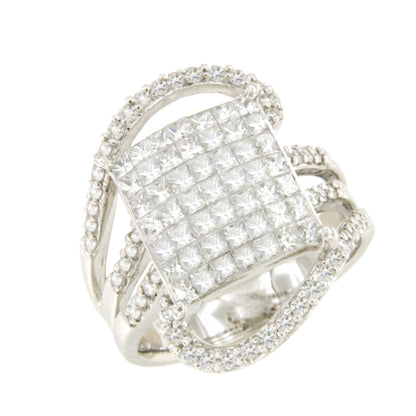 Anillo BADALONA en oro blanco de 18 ktes con brillantes y princesas.