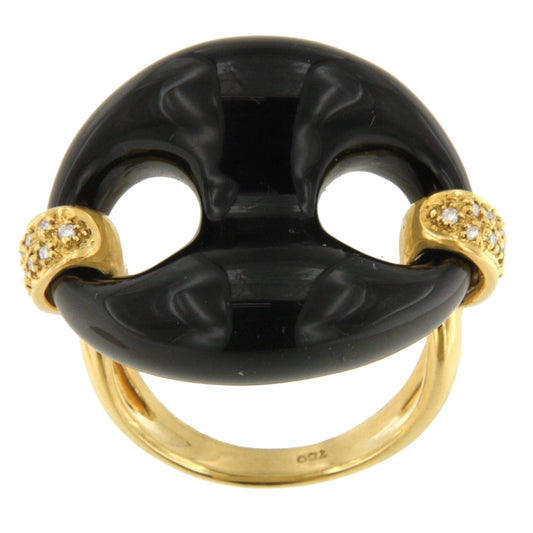 Anillo FIGUERAS en oro amarillo 18 kilates con onix y brillantes.