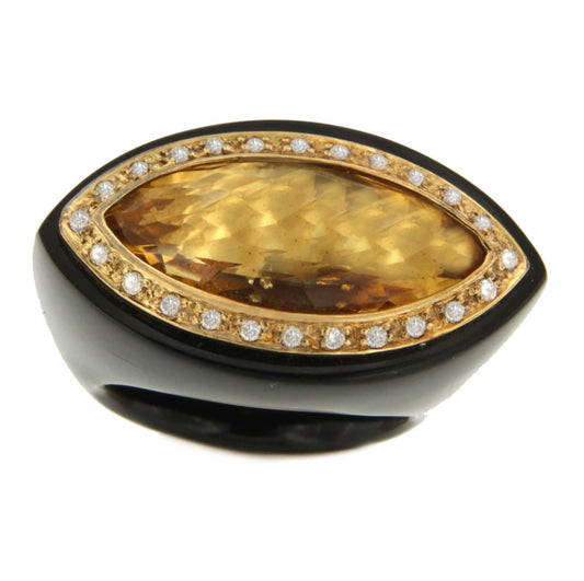 Anillo COMILLAS de onix con oro amarillo 18 kilates citrino y brillantes.