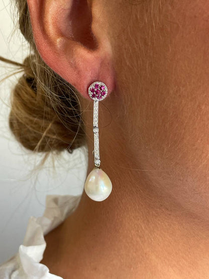 Pendientes PESARO  dormilones desmontables en oro blanco 18 ktes  con piedras.