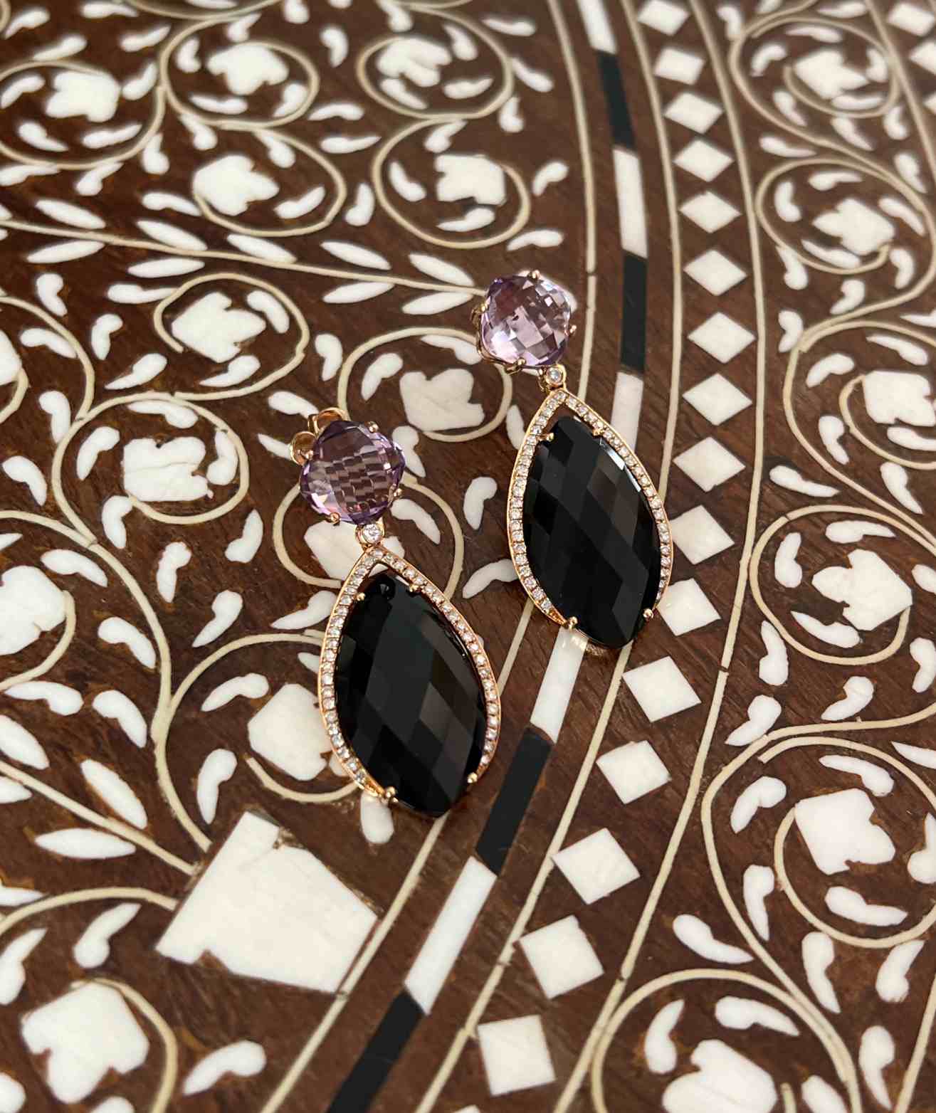 Long rose gold earrings with irregular stones