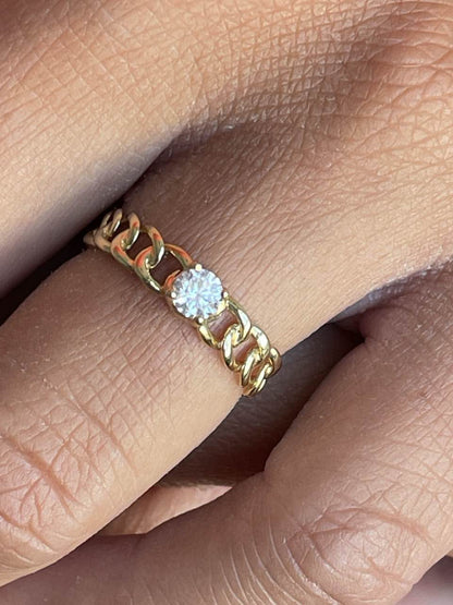 Anillo ELVAS oro amarillo de 18 kilates en brazo barbado con circonita