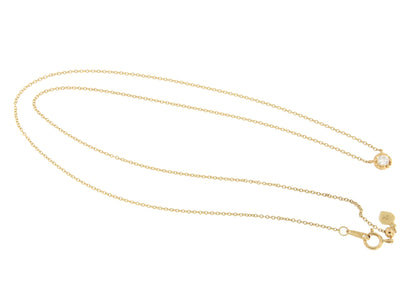 Cadenita DUKU con dije solitario de brillante en oro amarillo 18 ktes