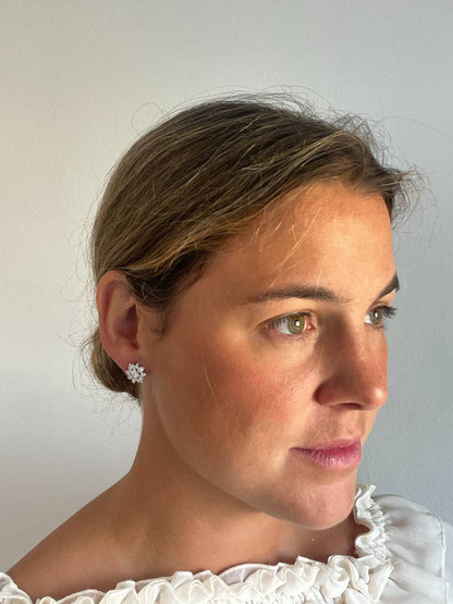 Pendientes CAIMITO estrella en oro blanco 18 ktes con brillantes y baguettes