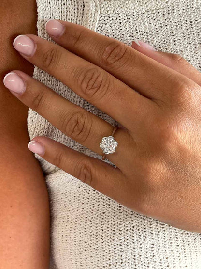 ACAI ring with rosette and halo and diamonds in 18-karat white gold