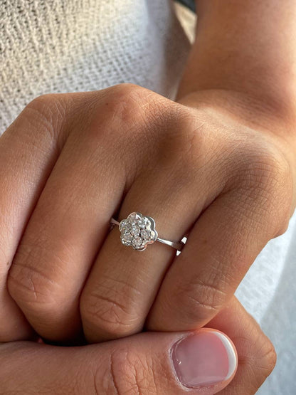 ACAI ring with rosette and halo and diamonds in 18-karat white gold