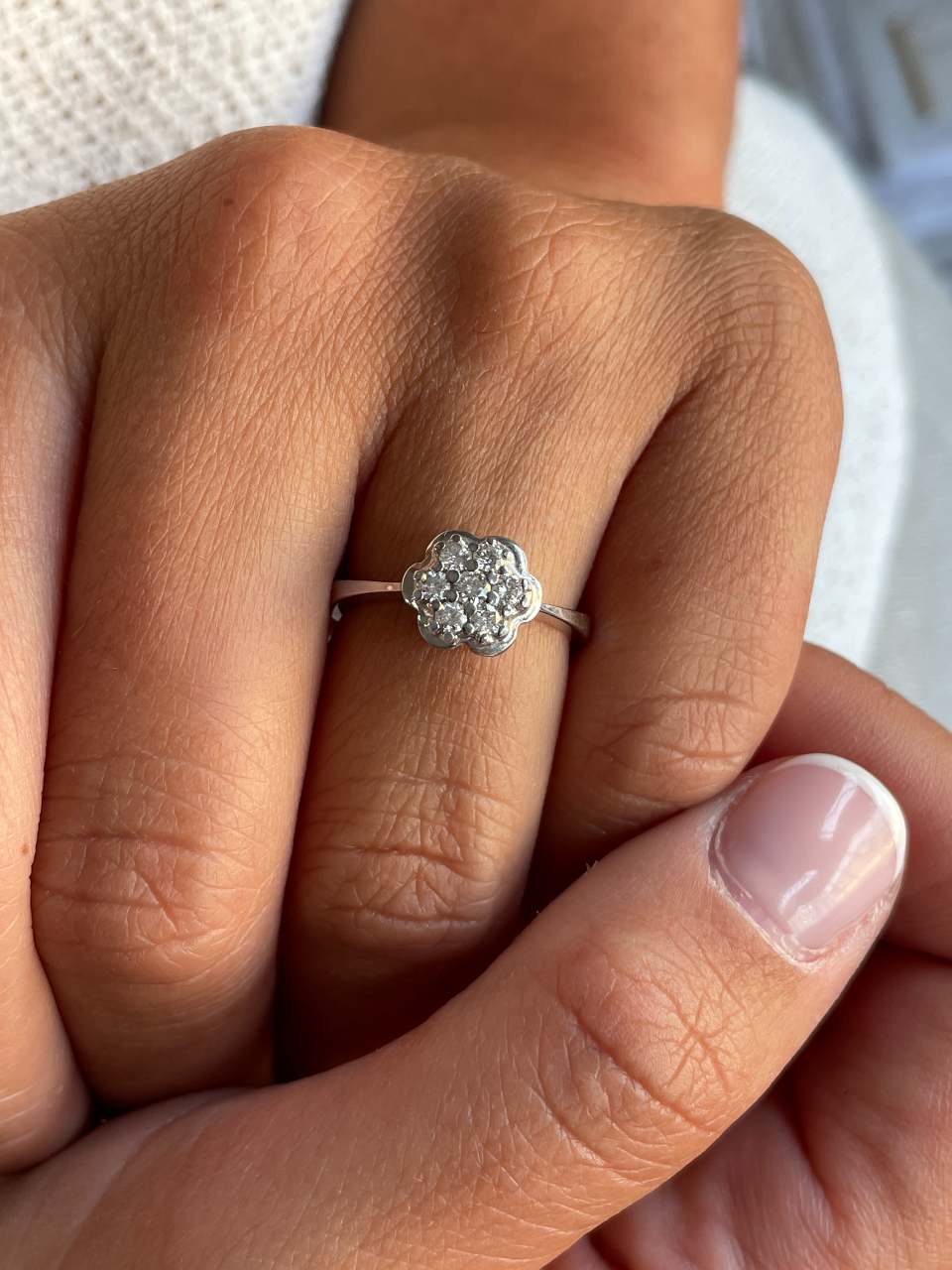 ACAI ring with rosette and halo and diamonds in 18-karat white gold