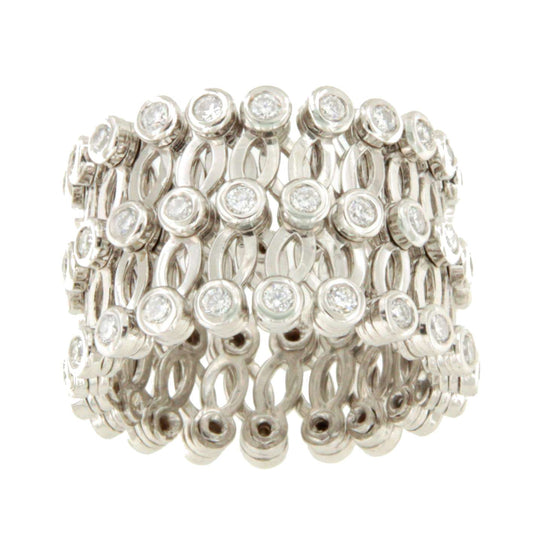 Anillo CAS y pulsera en brillantes de oro blanco en 18 kilates