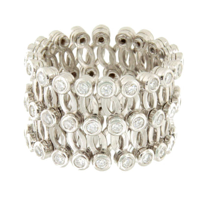 Anillo CAS y pulsera en brillantes de oro blanco en 18 kilates