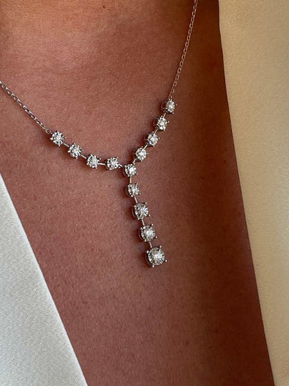 Gargantilla LIBERIA con chorrera tipo riviere de brillantes en oro blanco 18 ktes