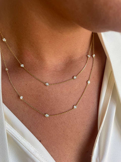 GUINEA long chain with brilliant-cut diamond settings in 18k yellow gold