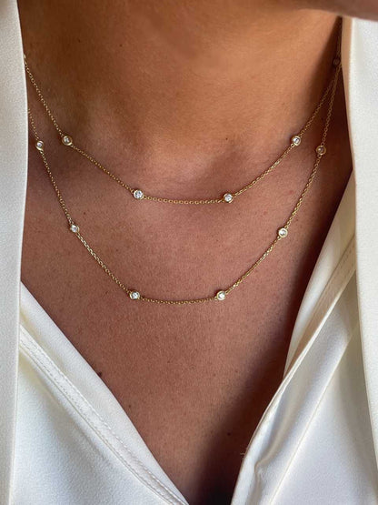 GUINEA long chain with brilliant-cut diamond settings in 18k yellow gold