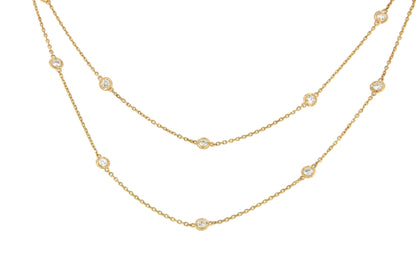 GUINEA long chain with brilliant-cut diamond settings in 18k yellow gold