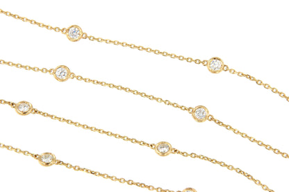 GUINEA long chain with brilliant-cut diamond settings in 18k yellow gold