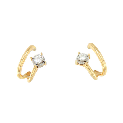 PEUMO short earrings in 18-karat yellow gold and diamonds.