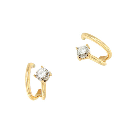 PEUMO short earrings in 18-karat yellow gold and diamonds.