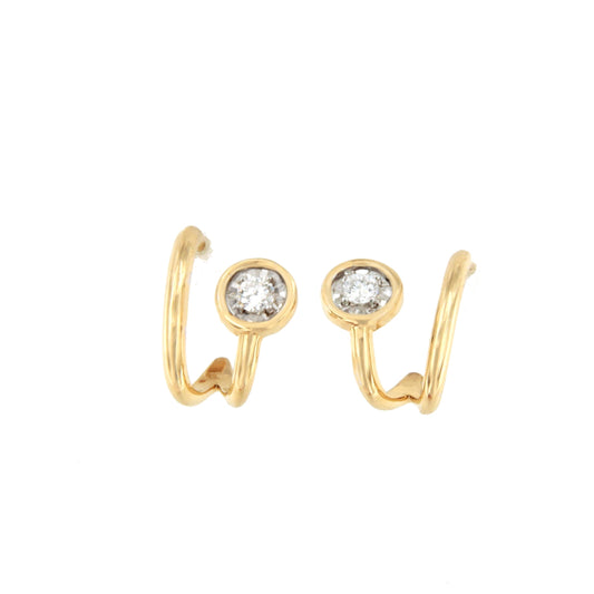 PEUMO short earrings in 18-karat yellow gold and diamonds.
