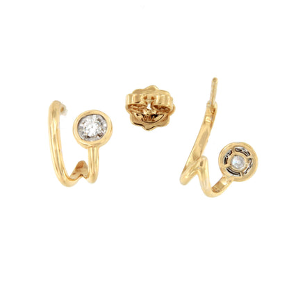 PEUMO short earrings in 18-karat yellow gold and diamonds.