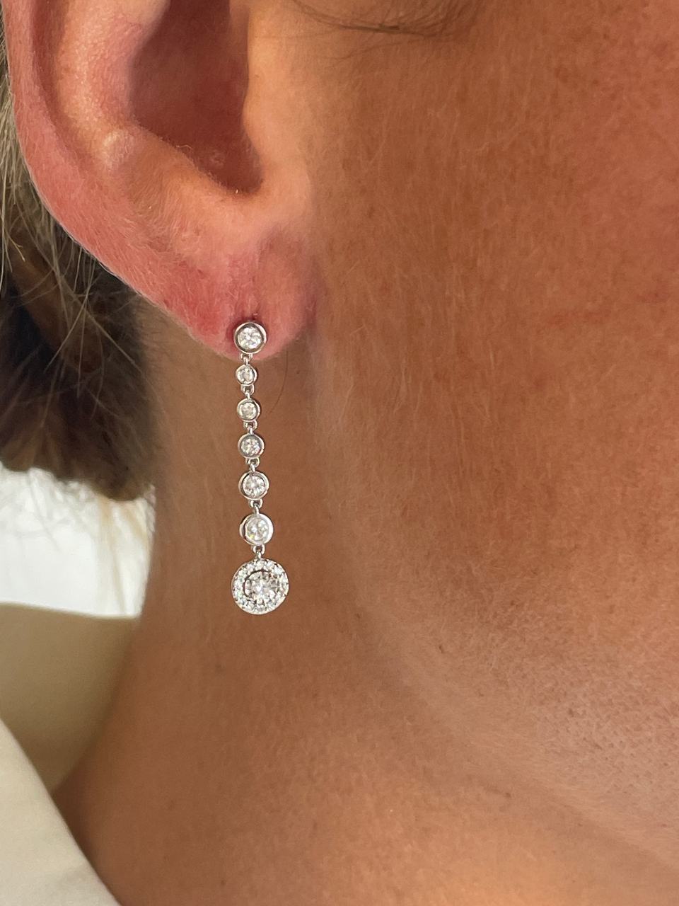 LIBIA long rosette diamond earrings in 18-karat white gold