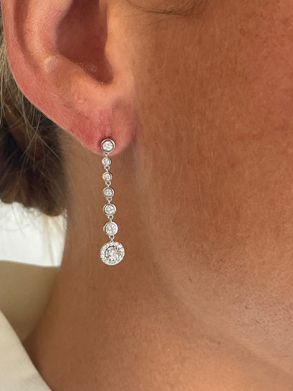 LIBIA long rosette diamond earrings in 18-karat white gold