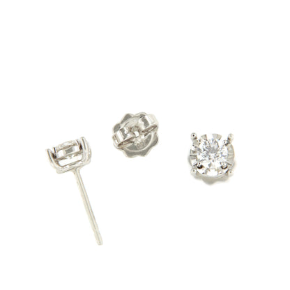 GUANA stud earrings with diamond studs and claw setting in 18k white gold.