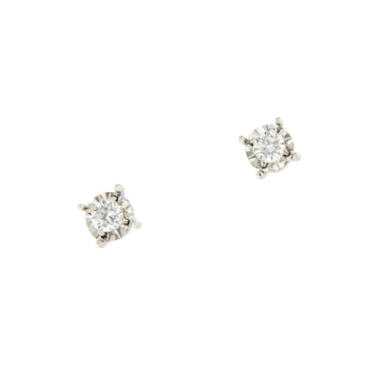 GUANA stud earrings with diamond studs and claw setting in 18k white gold.