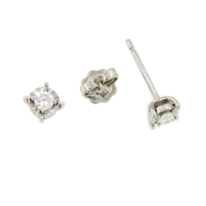 GUANA stud earrings with diamond studs and claw setting in 18k white gold.