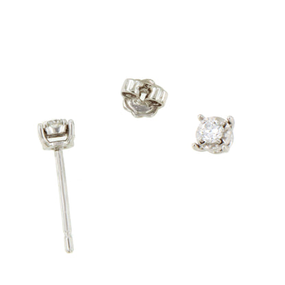 GUANA stud earrings with diamond studs and claw setting in 18k white gold.