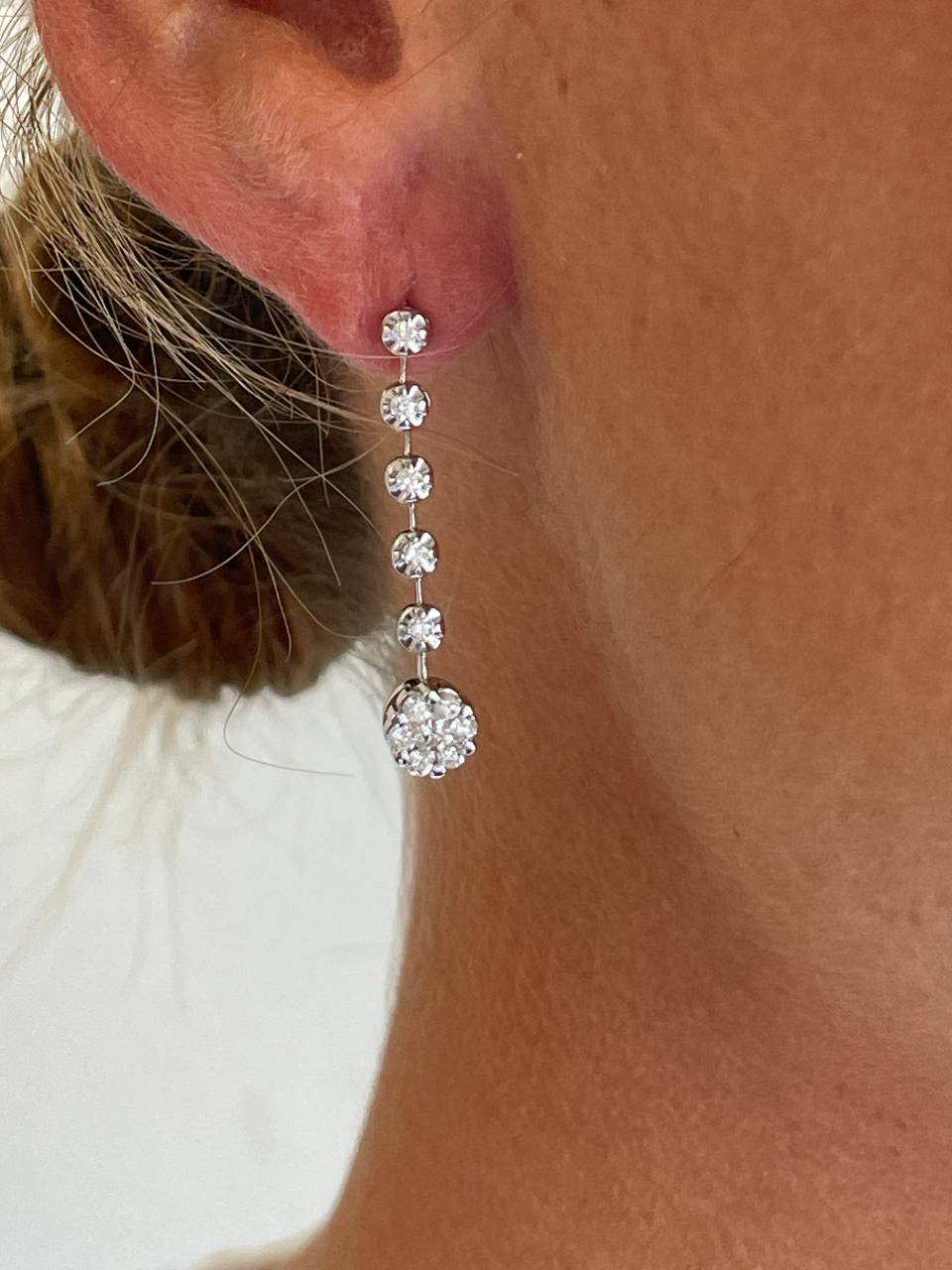 LIBIA long rosette diamond earrings in 18-karat white gold