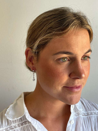 LIBIA long rosette diamond earrings in 18-karat white gold