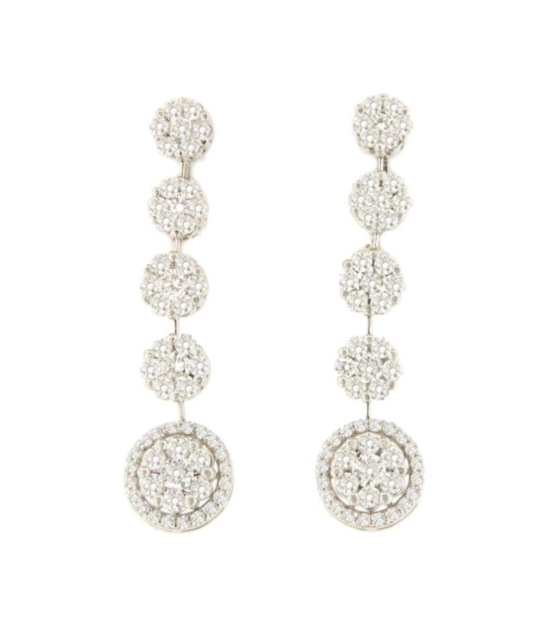 Pendiente KIMBERLEY largo oro blanco de 18 ktes con rosetas de brillantes.