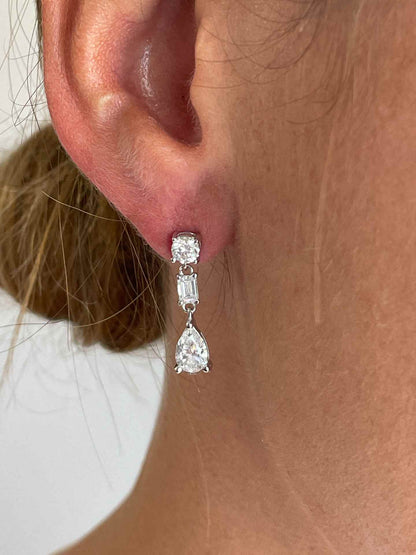 LIBIA long rosette diamond earrings in 18-karat white gold