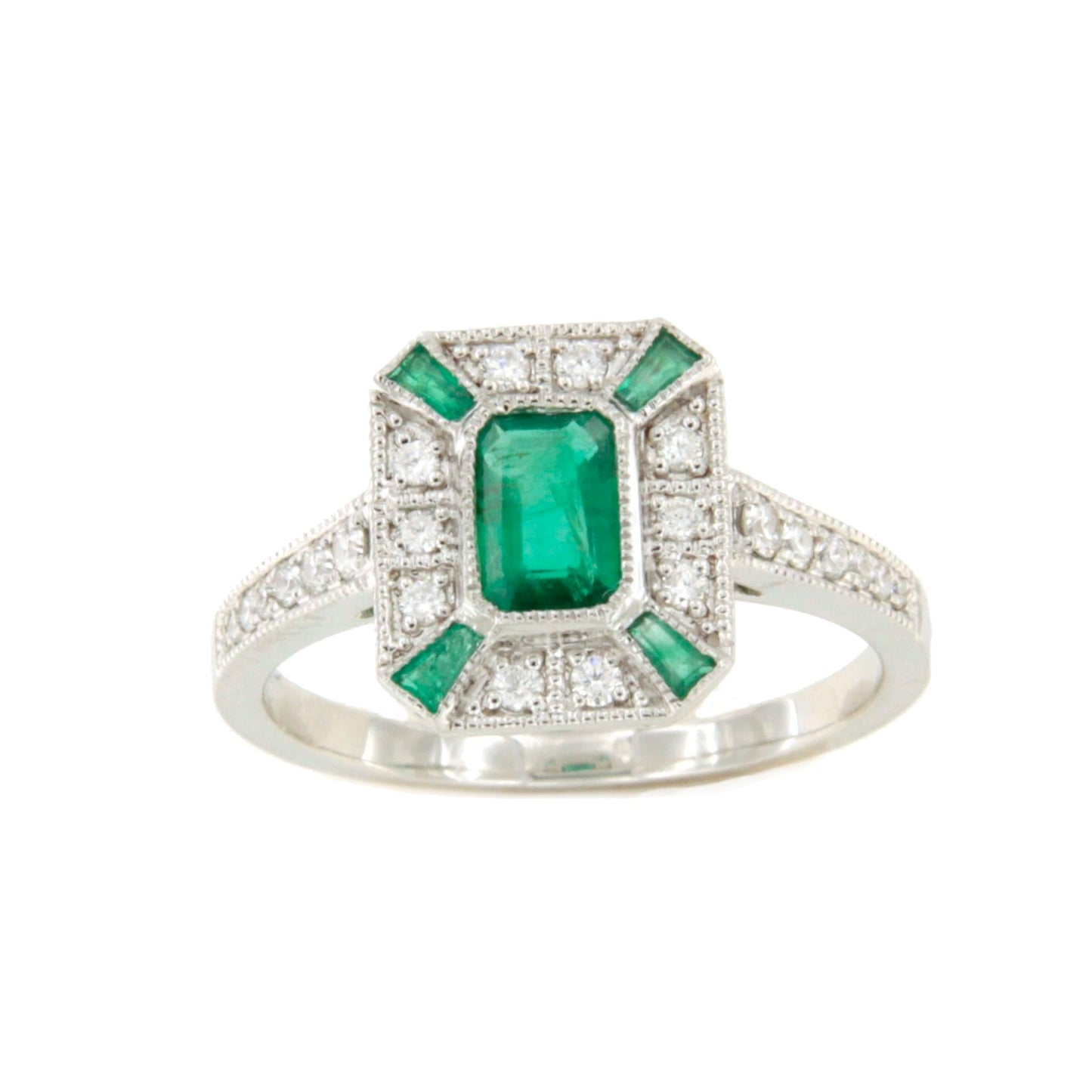 Anillo BAEL roseta esmeralda baguettes y brillantes en oro blanco 18 ktes.