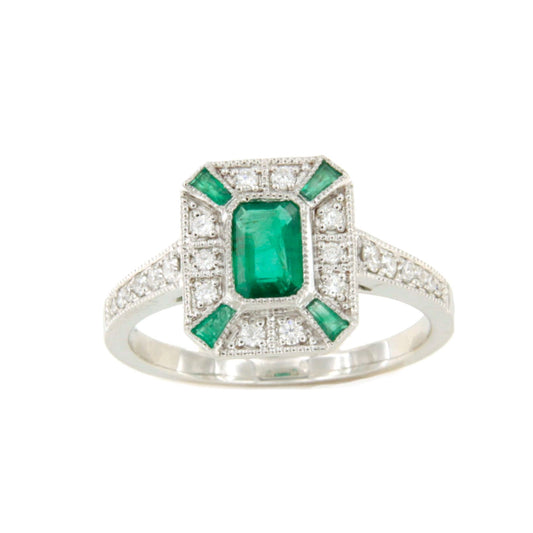 Anillo BAEL roseta esmeralda baguettes y brillantes en oro blanco 18 ktes.